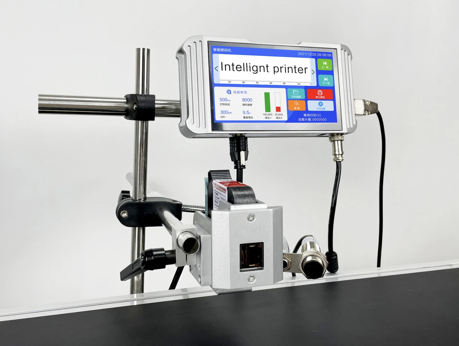 UKCM TIJ thermal inkjet system with 7-inch touchscreen controller, installed on conveyor